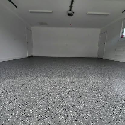 Completed grey flake epoxy garage floor